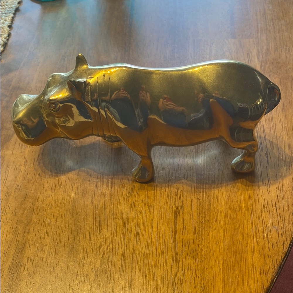 Vintage brass Hippo. Heavy weighs 2.2 pounds. Excellent condition. 9 inches x 4